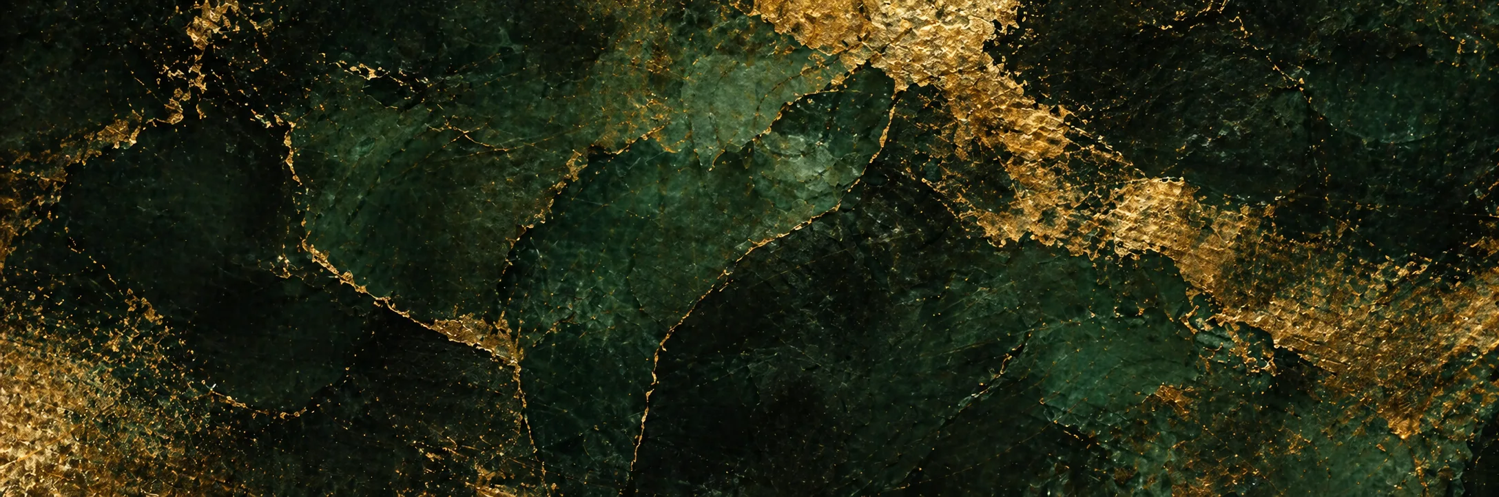 Abstract gold leaf texture layered over deep forest green